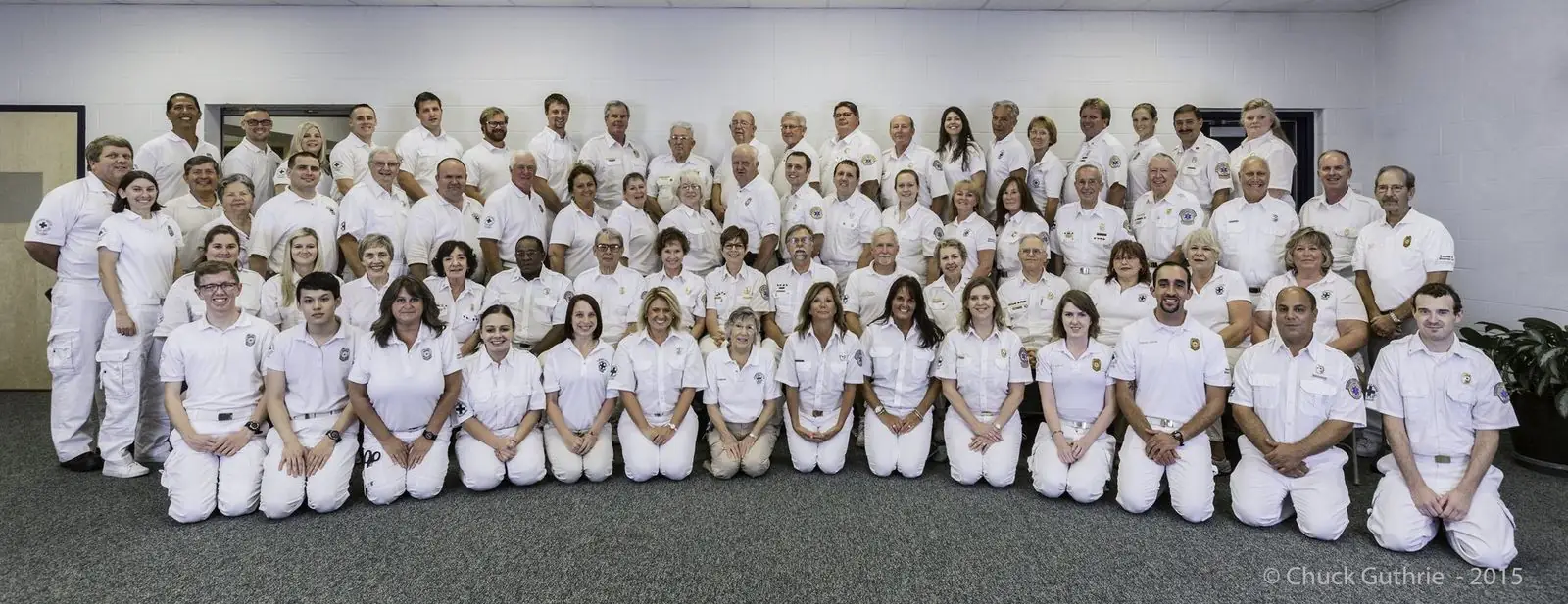 The full Virginia Beach Volunteer Rescue Squad membership gathered for a team photo in dress whites